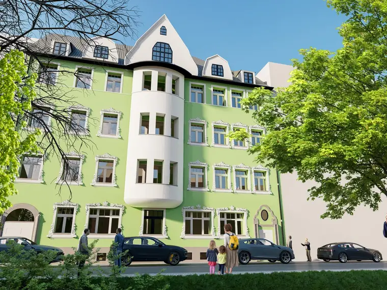Denkmalgeschütztes Gründerzeithaus mit Stuckfassade und Rundturm nach der Sanierung