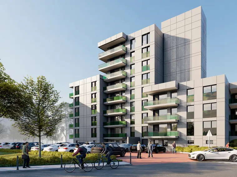 Wohnhochhaus mit vorgesetzten Balkonen nach der energetischen Sanierung